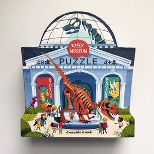 Crocodile Creek “Day at the Museum” Dinosaur Puzzle - 48 pieces